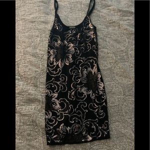 Sexy Express sequin slip dress.